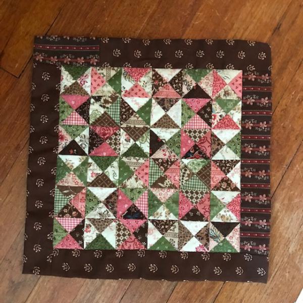 Betsy Chutchian Pickled Pink mystery doll quilt