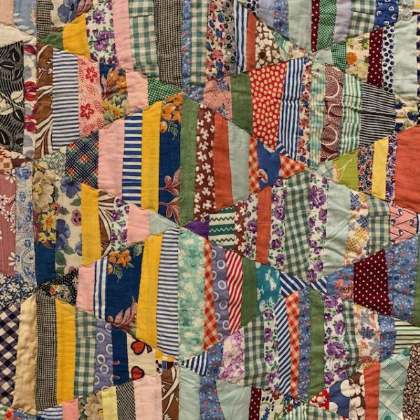 Detail Teddy Pruett "flags" quilt Iowa Quilt Museum string-piecing exhibition